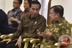 Ketika Jokowi dan JK Bertukar "Baju"