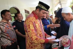 Wakil Bupati Simalungun Serahkan Kartu BPJS Kesehatan