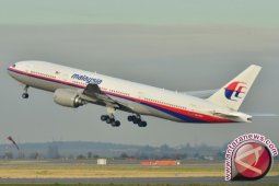 AP II Evakuasi Malaysia Airlines Pecah Ban