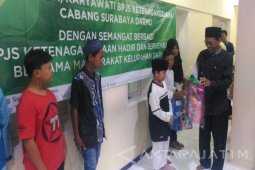 BPJS Ketenagakerjaan Darmo Santuni Puluhan Dhuafa