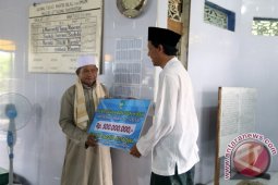 PENYERAHAN DANA HIBAH