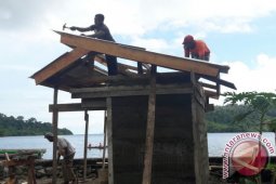 TMMD Bangun MCK Bagi Masyarakat  Raja Ampat