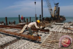 PEMBANGUNAN PELABUHAN KUALA TANJUNG