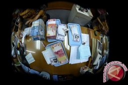 Rupiah Senin pagi menguat tipis