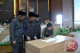 MENANDATANGANI NOTA KESEPAKATAN KUPA DAN PPAS