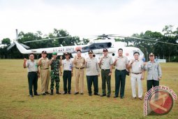 MEMANTAU TITIK API DI WILAYAH TANAH LAUT