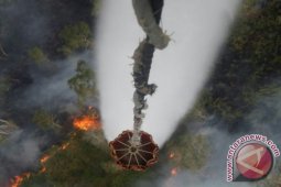 BPBD Kalsel Kerahkan Heli Padamkan Titik Api