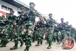 TNI Putussibau Persembahkan Defile Dan Yongmoodo