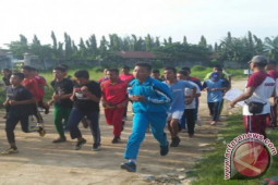 Polsek Perdagangan Latih Fisik Ratusan Pelajar