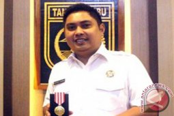 Bupati Tanbu Terima Penghargaan "Dwija Praja Nugraha"