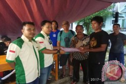 Pemuda Katolik Bantu Korban Kebakaran Rumah Betang