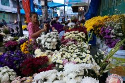 Penjual bunga panen