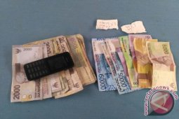 Polisi Tangkap Tukang Parkir Berjudi Kupon Putih