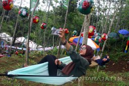 Kampung Desaku Menanti