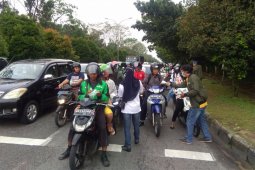 Relawan Midji Norsan bagikan masker gratis