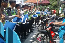 Polisi berseni "didong" sosialisasi tertib lantas