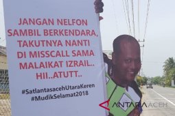 Arus mudik - Ingatkan pemudik polisi sebarkan poster maneken lucu