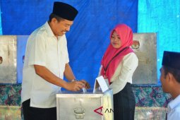Wabup Gunakan Hak Suara Di Kampung Halaman