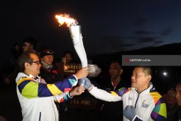 Hujan Deras Sambut Kirab Obor di Banyuwangi