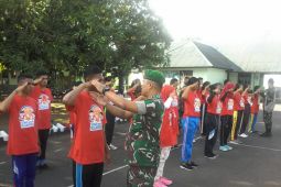 BUMN HADIR - Peserta Bela Negara SMN PLN-PNM latihan PBB