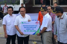 BPJS Ketenagakerjaan serahkan bantuan korban gempa Lombok