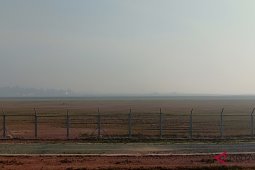 Bandara Syamsudin Noor diselimuti kabut asap