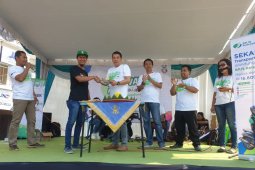 BPJS Ketenagakerjaan Madiun Ramaikan Perayaan HUT ke-8 Gojek