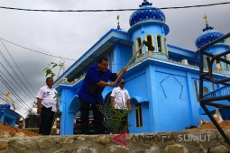 Delmeria Syarfi Hutauruk motivasi masyarakat dengan menanam kurma