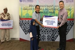 BI bantu masjid dan panti asuhan