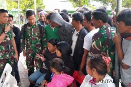 Penyambutan jenazah  korban penembakan kelompok kriminal bersenjata