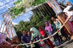 Infrastructure development as a prize for Padang Batung