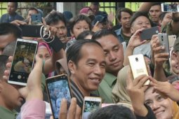 Presiden Jokowi awali 2019 dengan berolahraga dan sapa warga