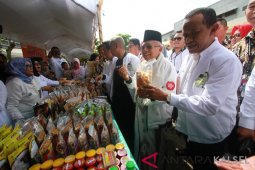 TINJAU PAMERAN