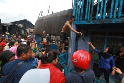 kebakaran di kawasan Pelambuan
