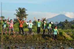 Pemkot Denpasar-Komunitas Hash gelar "Jalan Santai Go Green" susuri persawahan