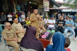 Pedagang pasar Tanjung terima kredit gerbang emas