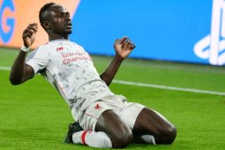 Liverpool berhasil melaju ke perempat final setelah tumbangkan Munchen di kandang
