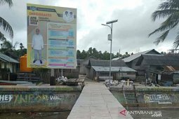Kades Tayando Langgiar pasang Baleho Dana Desa