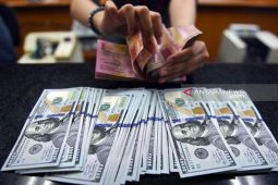Rupiah menguat akhir pekan karena intervensi Bank Indonesia