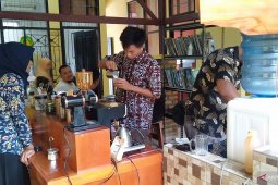 Lopo "Ngopiko" di kantor TNBG