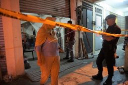 Lokasi surat suara tercoblos telah diberi "police line"