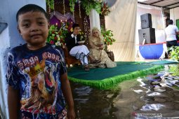 Pernikahan di tengah banjir