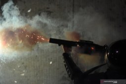 Amnesty Internasional nilai tindakan "eksesif" saat polisi diserang dalam kericuhan Mei