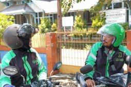 Fahrul - Yeni, suami istri driver GrabBike Pontianak yang ikut beramal