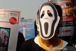 Kerugian akibat rokok  sepertiga PDB dan seperlima APBN