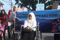 Dari kursi roda drg Romi melanjutkan perjuangan menjadi ASN