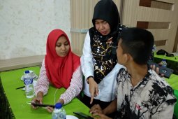 Kepiawaian Sri Suryati dampingi tiga siswa difabel peserta SMN Jambi