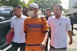 Tersangka kasus rasisme di asrama mahasiswa Papua minta maaf