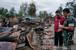 TNI-Polri serta masyarakat kerja bakti setelah kerusuhan Wamena