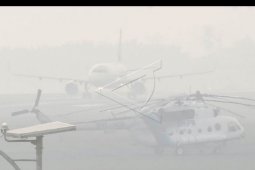 Kabut asap ganggu penerbangan di Palembang